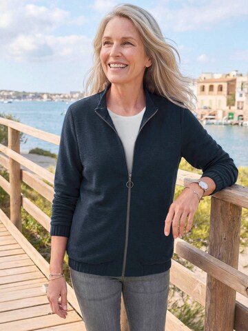 Goldner Jacke in Blau