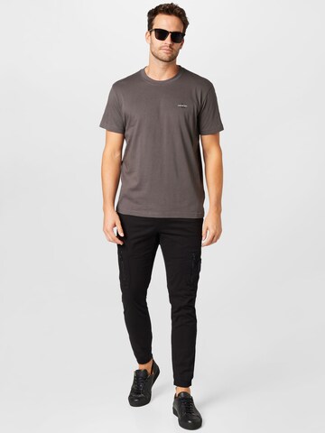 Calvin Klein Jeans Tričko – šedá