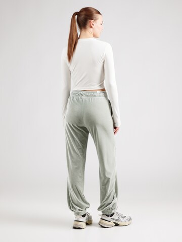 Nike Sportswear Tapered Trousers in Green