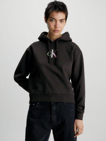 Sweat-shirt Calvin Klein Jeans en noir : devant