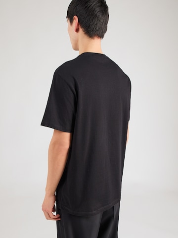 GUESS Тениска в черно