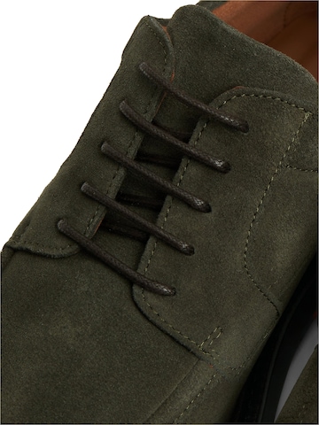 Chaussure à lacets TOMMY HILFIGER en vert