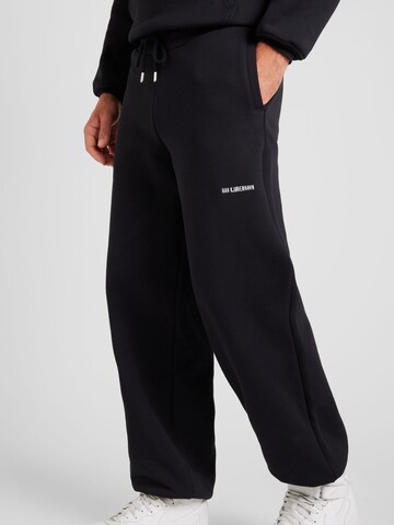 Han Kjøbenhavn Tapered Trousers 'Daily' in Black