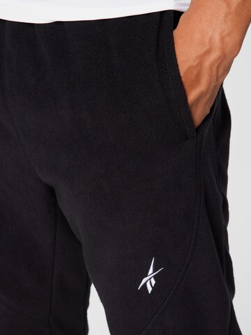 Tapered Pantaloni sportivi di Reebok in nero