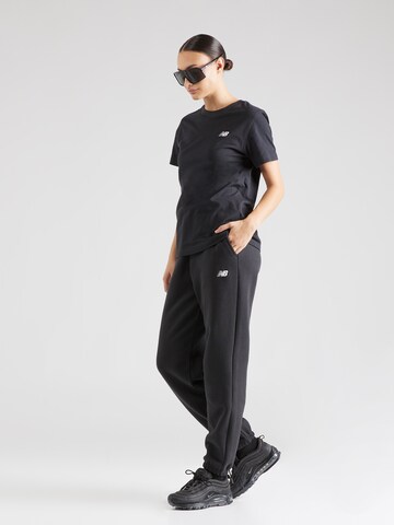 new balance - Camiseta funcional 'Essentials' en negro