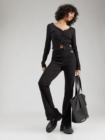Calvin Klein Jeans Zvonový Kalhoty – černá