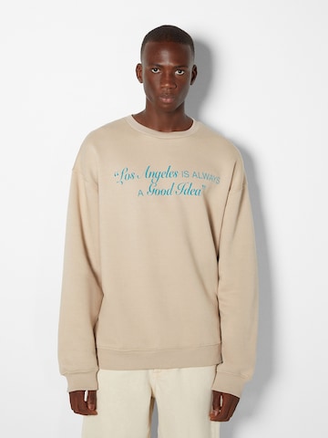 Sweat-shirt Bershka en beige : devant