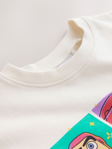 Next - Camiseta 'Toy Story Woody Jessie Buzz Lightyear' en beige
