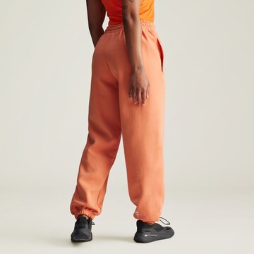 ADIDAS BY STELLA MCCARTNEY Tapered Sporthose in Orange