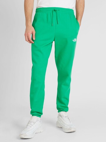 Effilé Pantalon 'ESSENTIAL' THE NORTH FACE en vert : devant