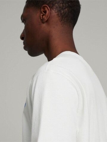 Maglietta 'Puma X Kidsuper Graphic Tee' di PUMA in bianco