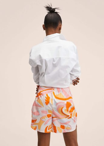 MANGO Normalny krój Spodnie 'Puc' w kolorze pomarańczowy