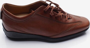 Tod's Flats & Loafers in 38 in Brown: front