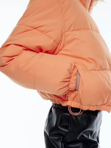 EDITED Zimní bunda 'Nikole' – oranžová