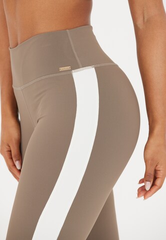 Athlecia Skinny Sports trousers 'Lris' in Brown