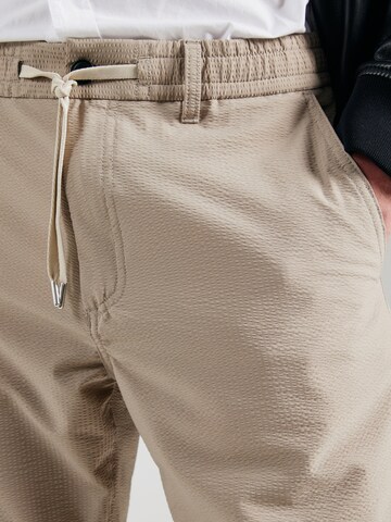 Regular Pantalon chino BOSS en beige