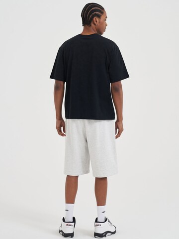 AND1 Póló - fekete