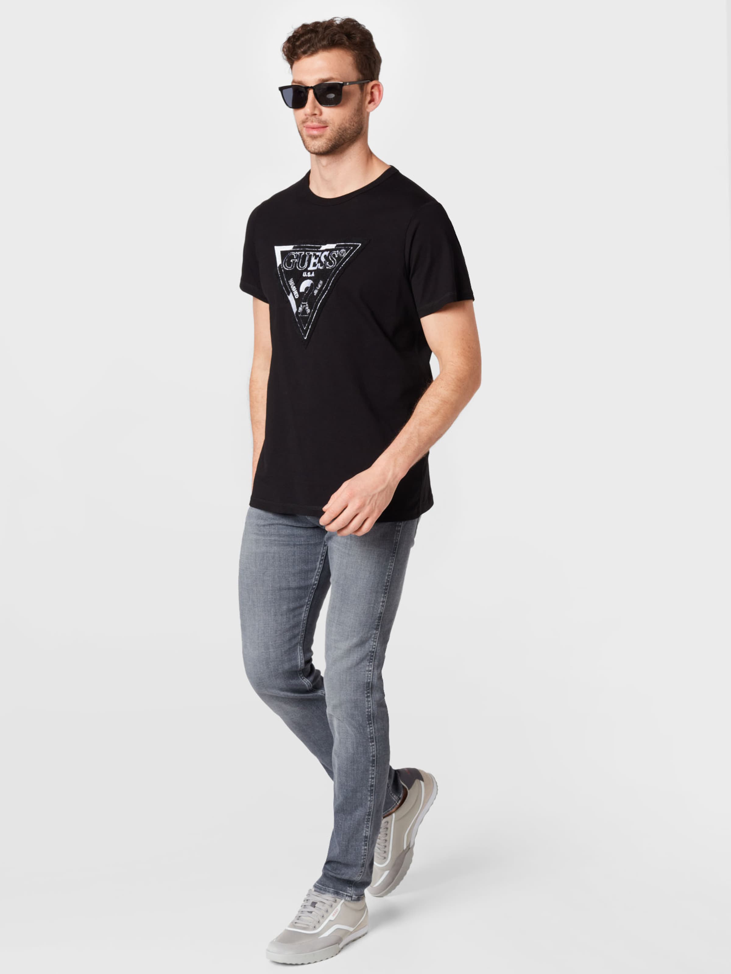Männer Shirts GUESS T-Shirt 'POSNE' in Schwarz - ZZ74616