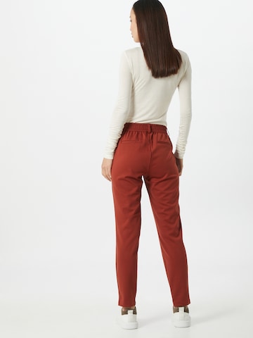 Tapered Pantaloni chino di TOM TAILOR DENIM in arancione