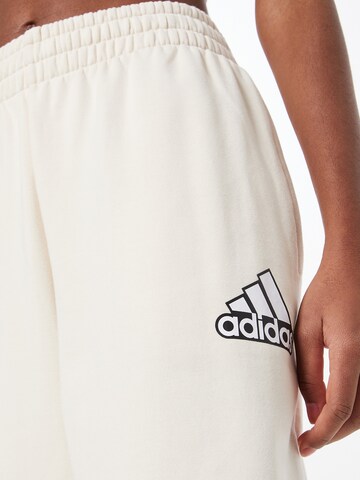 ADIDAS SPORTSWEAR Tapered Workout Pants in White