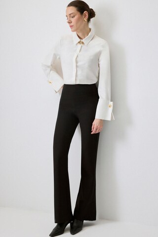 Touche Prive Boot cut Trousers in Black