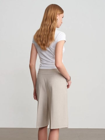 Wide leg Pantaloni di Dilvin in beige