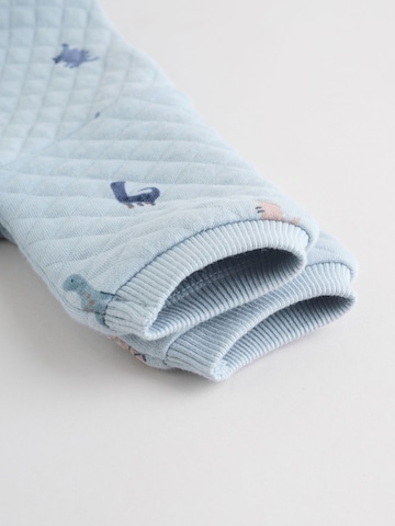 Set Next en bleu