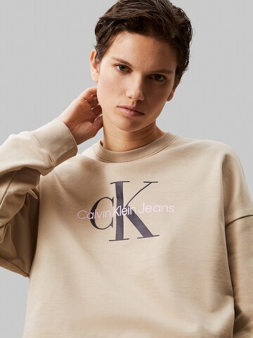 Calvin Klein JeansSweater majica - bež boja
