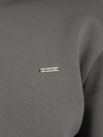 Veste de survêtement Smilodox en gris