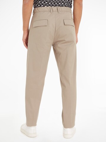 Calvin Klein Regular Pleat-Front Pants in Beige