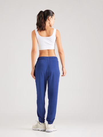 Tapered Pantaloni sportivi di 4F in blu