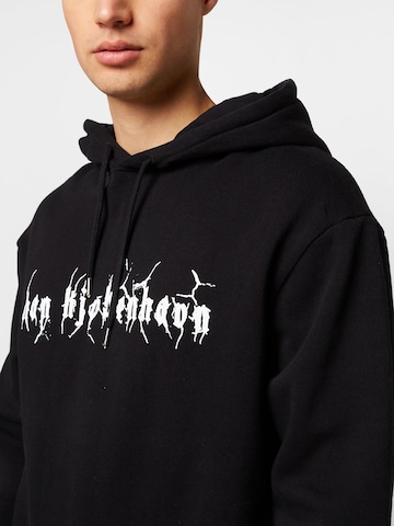 Han Kjøbenhavn Sweatshirt in Zwart