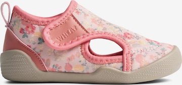 Claquettes / Tongs 'Swirl' WHEAT en orange : devant