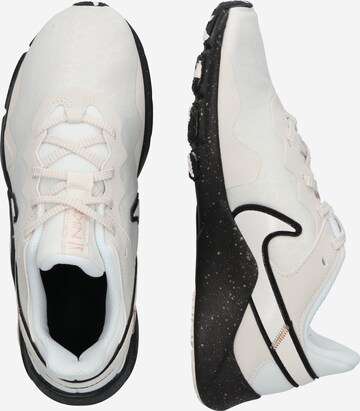smėlio NIKE Sportiniai batai 'Legend Essential 2 Premium'