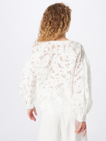 Club Monaco - Blusa en blanco