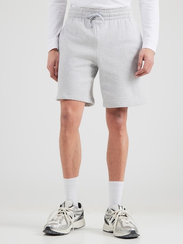 UNDER ARMOUR Regular Workout Pants in Grey: front