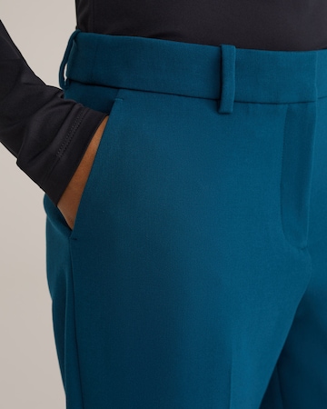 WE Fashion Liibuv Viikidega püksid, värv roheline