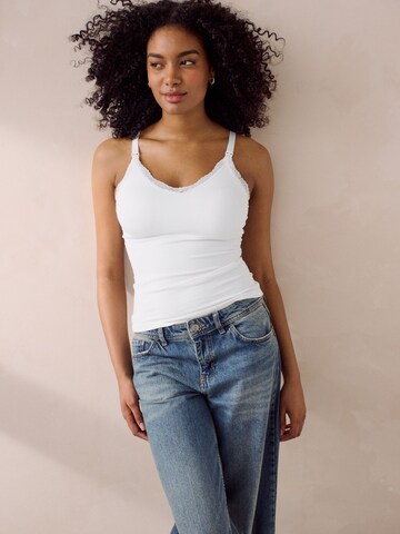 Next - Top en blanco