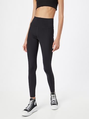 Girlfriend Collective - Skinny Calças de desporto em preto: frente