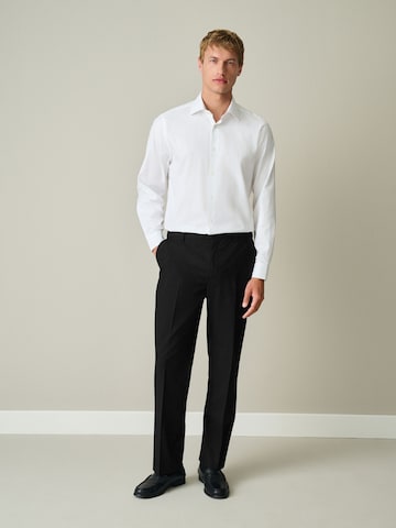 Next Regular Trousers with creases 'Motionflex' in Black
