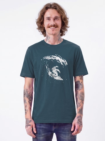 Watapparel Shirt 'Surfing Spaceman' in Blauw: voorkant