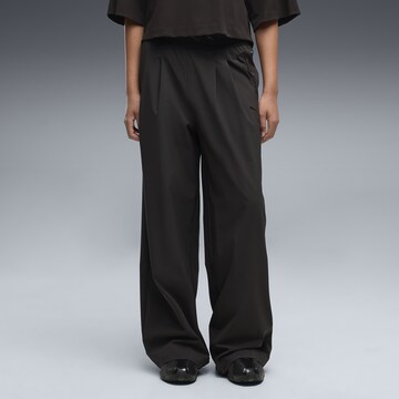 PUMA Loose fit Athletic Pants in Black: front