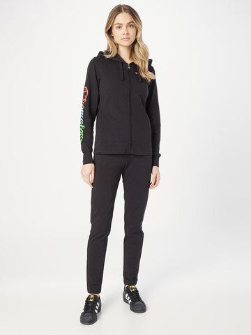 Champion Authentic Athletic Apparel Sweatsuit in Black: front