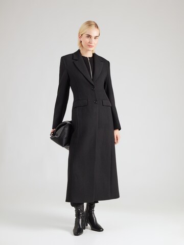 Monki Between-seasons coat in Black: front