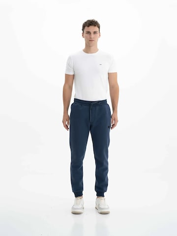 Arma Regular Trousers in Blue