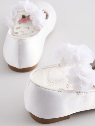 Next - Bailarina en blanco