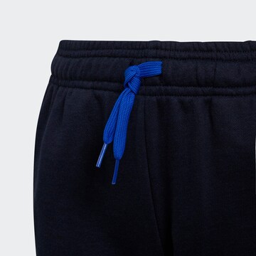 ADIDAS SPORTSWEAR Zwężany krój Spodnie sportowe w kolorze niebieski