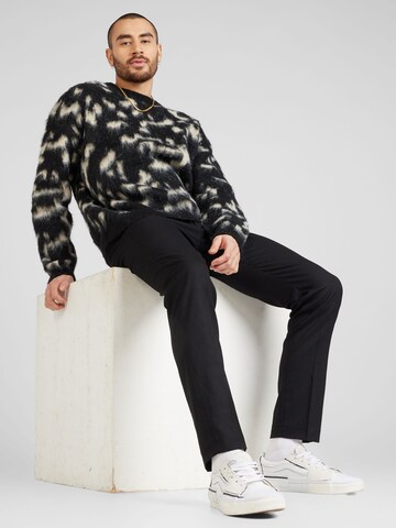 Regular Pantaloni cutați de la TOPMAN pe negru