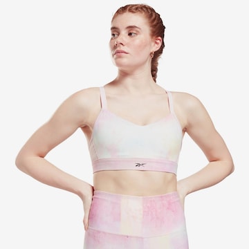 Reebok Bustier Sport bh 'Lux Strappy' in Roze: voorkant