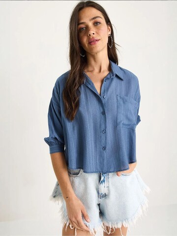 Bianco Lucci - Blusa em azul: frente